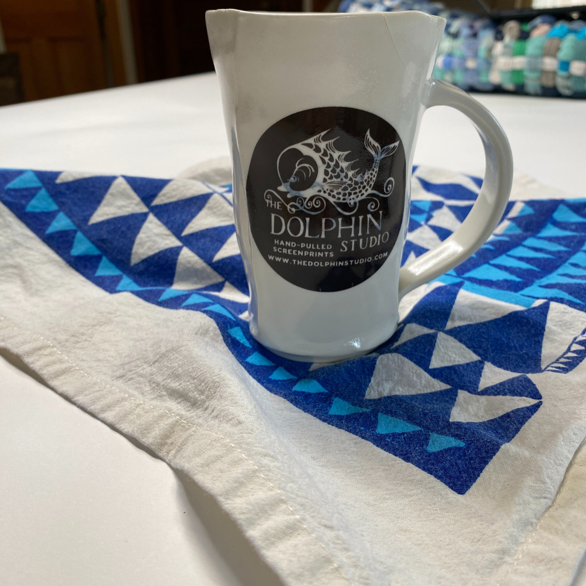 Handmade porcelain Dolphin Studio mug by Dan Bellow
