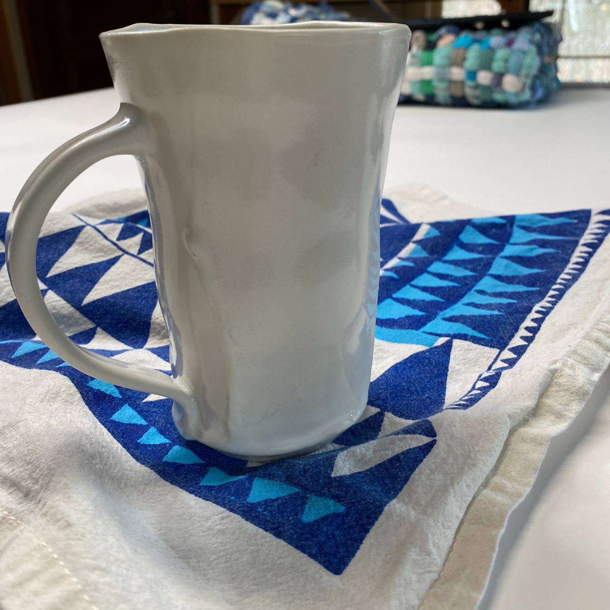 Handmade porcelain Dolphin Studio mug by Dan Bellow