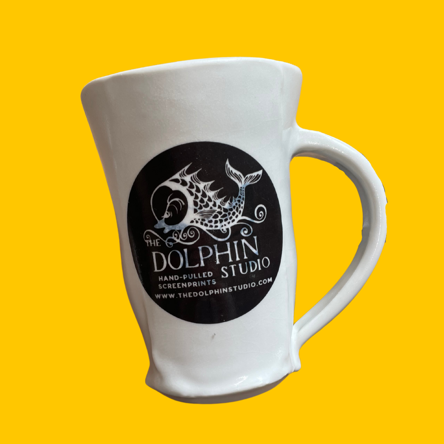 Handmade porcelain Dolphin Studio mug by Dan Bellow