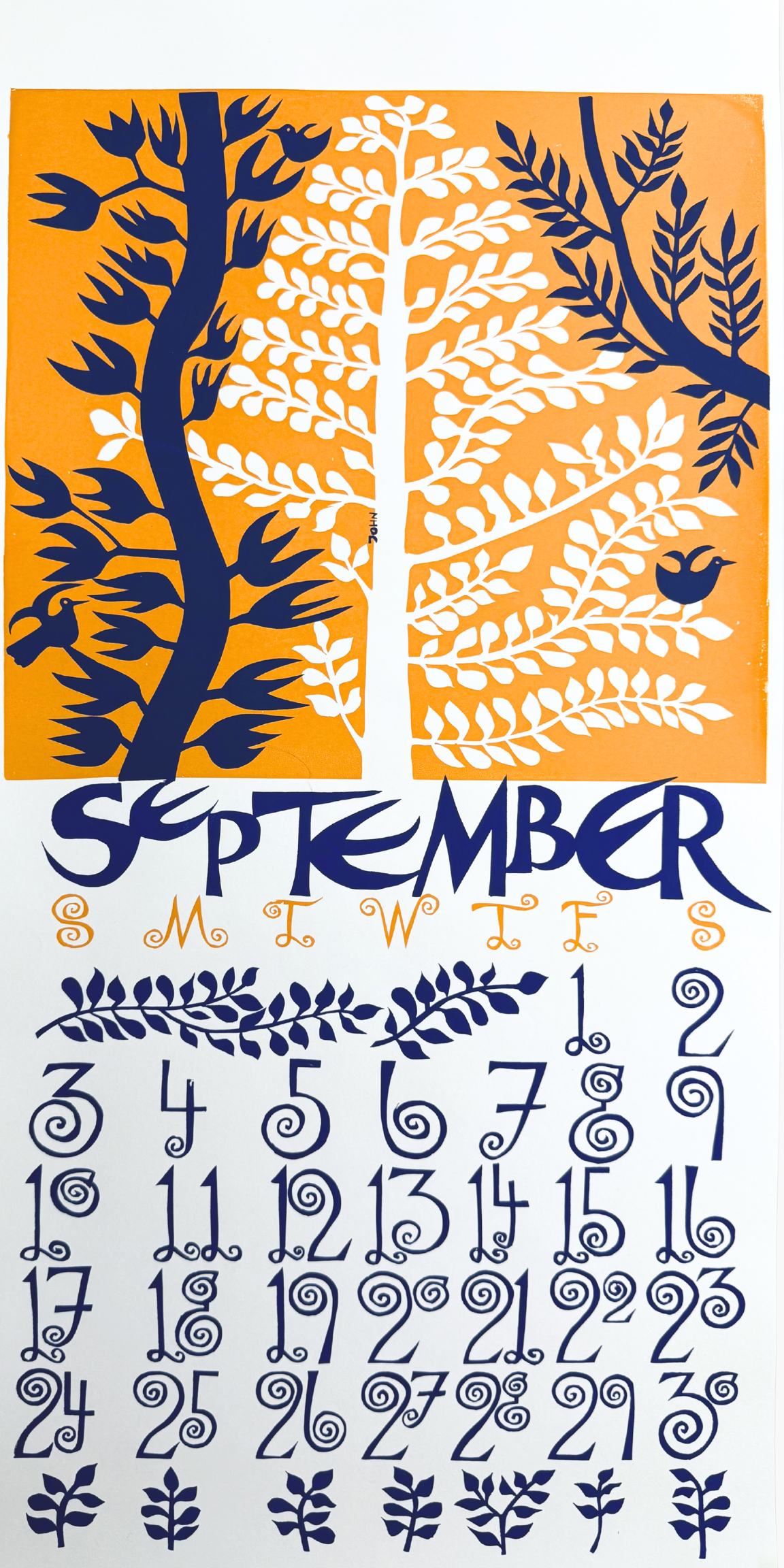 September calendar with stylized tree and leaves on an orange background